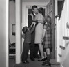 Kids with mother greeting father coming back home Poster Print - Item # VARSAL255420989