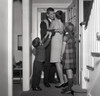 Kids with mother greeting father coming back home Poster Print - Item # VARSAL255420989