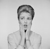 Studio portrait of woman with head in hands Poster Print - Item # VARSAL255422441B