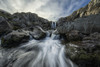 Stream flows over a waterfall and through the rocks along the eastern coast of Iceland; Iceland PosterPrint - Item # VARDPI12296399