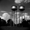 Water tanks against cloudy sky Poster Print - Item # VARSAL255424691