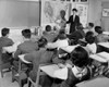 Female teacher pointing to a map in a classroom Poster Print - Item # VARSAL2558581