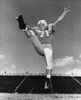 Low angle view of a football player kicking Poster Print - Item # VARSAL25517198