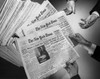 Close-up human hands holding newspapers Poster Print - Item # VARSAL25539067