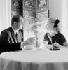 Mid adult couple having dinner in restaurant Poster Print - Item # VARSAL255418579