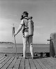 Man on jetty preparing for underwater diving Poster Print - Item # VARSAL255416339