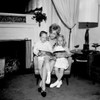 Mother with children reading in living room Poster Print - Item # VARSAL255417659