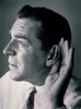 Close-up of a mature man with a cupped hand to his ear Poster Print - Item # VARSAL2554971