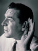 Close-up of a mature man with a cupped hand to his ear Poster Print - Item # VARSAL2554971