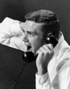Close-up of a young man shouting on the telephone Poster Print - Item # VARSAL25514653