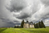 Church in a rural setting with storm clouds overhead; Winnipeg, Manitoba, Canada PosterPrint - Item # VARDPI12273034