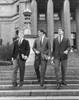 Low angle view of three young men walking down steps Poster Print - Item # VARSAL25516756