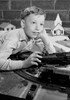 Boy playing with toy train Poster Print - Item # VARSAL255417006
