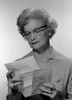 Senior woman reading letter  studio shot Poster Print - Item # VARSAL25548979