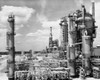 Smoke stacks in an oil refinery  Tidewater Oil Company  Delaware  USA Poster Print - Item # VARSAL25518781