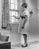 Side profile of a pregnant woman looking through a window Poster Print - Item # VARSAL25542192