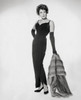 Young woman holding fur shawl Poster Print - Item # VARSAL25527239