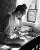 Side profile of a young woman studying Poster Print - Item # VARSAL25522489