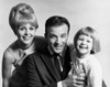 Mid adult couple with their daughter smiling Poster Print - Item # VARSAL2557312
