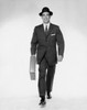 Studio portrait of businessman carrying briefcase Poster Print - Item # VARSAL25548141