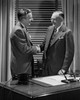 Two businessmen shaking hands Poster Print - Item # VARSAL2553076B