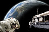 An artist's depiction of a team of astronauts performing work on a space station while orbiting a large, Earth-like planet. Poster Print - Item # VARPSTMRC200085S