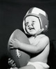 Close-up of a baby boy holding a football Poster Print - Item # VARSAL255629