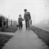 Father walking with his son on walkway Poster Print - Item # VARSAL25519463