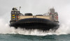 Arabian Gulf, February 1, 2012 - A landing craft air cushion assigned to Assault Craft Unit 5 approaches the well deck of the amphibious transport dock ship USS New Orleans Poster Print - Item # VARPSTSTK105217M
