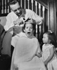 Father cutting his son's hair Poster Print - Item # VARSAL2553630B