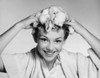 Portrait of a young woman washing her hair Poster Print - Item # VARSAL25518734