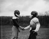 Two football players shaking hands Poster Print - Item # VARSAL255419279 Two football players shaking hands Poster Print - Item # VARSAL255419279