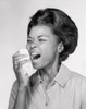 Close-up of a young woman sneezing Poster Print - Item # VARSAL25526368