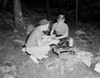 Young couple preparing food and drink on barbecue grill Poster Print - Item # VARSAL255422192