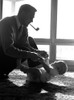 1950s Silhouetted By Window Light Father Pipe In Mouth Kneeling Down To Play With Baby Lying On Sunlit Floor Print By - Item # PPI177185LARGE