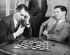 Two businessmen playing checkers in an office Poster Print - Item # VARSAL2558041