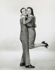 Side profile of a young couple embracing each other Poster Print - Item # VARSAL25539164