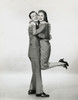 Side profile of a young couple embracing each other Poster Print - Item # VARSAL25539164