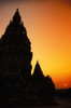 Indonesia, Java, Prambanan, Shiva Mahadeva Temple Silhouetted At Sunset PosterPrint