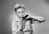 Portrait of boy playing harmonica  studio shot Poster Print - Item # VARSAL255419917
