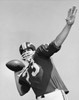 Football player throwing a football Poster Print - Item # VARSAL25521784