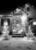 Christmas decorations outside house at night Poster Print - Item # VARSAL255417055
