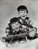 Two boys sliding on a sled Poster Print - Item # VARSAL25516507A
