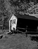 Young woman sitting outside shed Poster Print - Item # VARSAL255416896