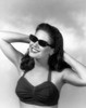 Close-up of a young woman smiling with her hands behind her head Poster Print - Item # VARSAL2941122