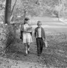 Boy and girl walking to school Poster Print - Item # VARSAL255416513