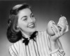Close-up of young woman holding two pears Poster Print - Item # VARSAL2552894