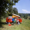 1970s Father And Son Cooking At Campsite Beside Red Pop Top Vw Caravan Camper Print By Vintage Collection - Item # PPI177442LARGE