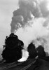 1930s-1940s Head-On View Of Three Steam Engines Silhouetted Against Billowing Smoke And Steam Outdoor Print By Vintage - Item # PPI172438LARGE