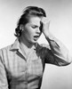 Young woman suffering from a headache Poster Print - Item # VARSAL25534862